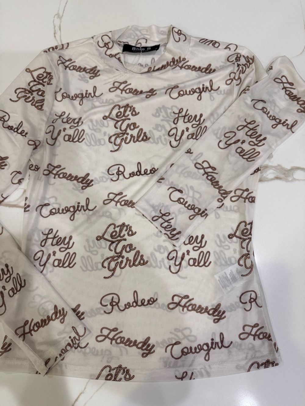 Sheer Western Script Long Sleeve Top - White with Brown Text